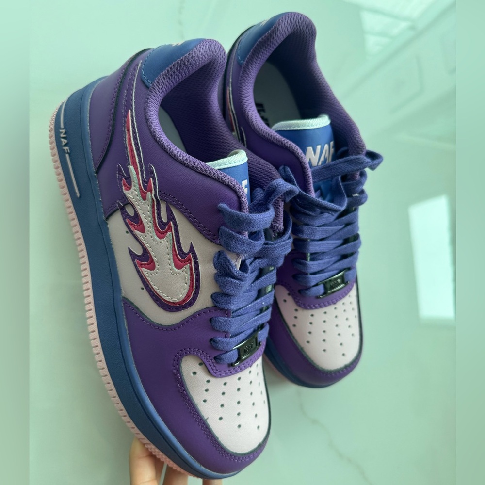 Nike Women’s Purple & Lavender Flame Detail Sneakers